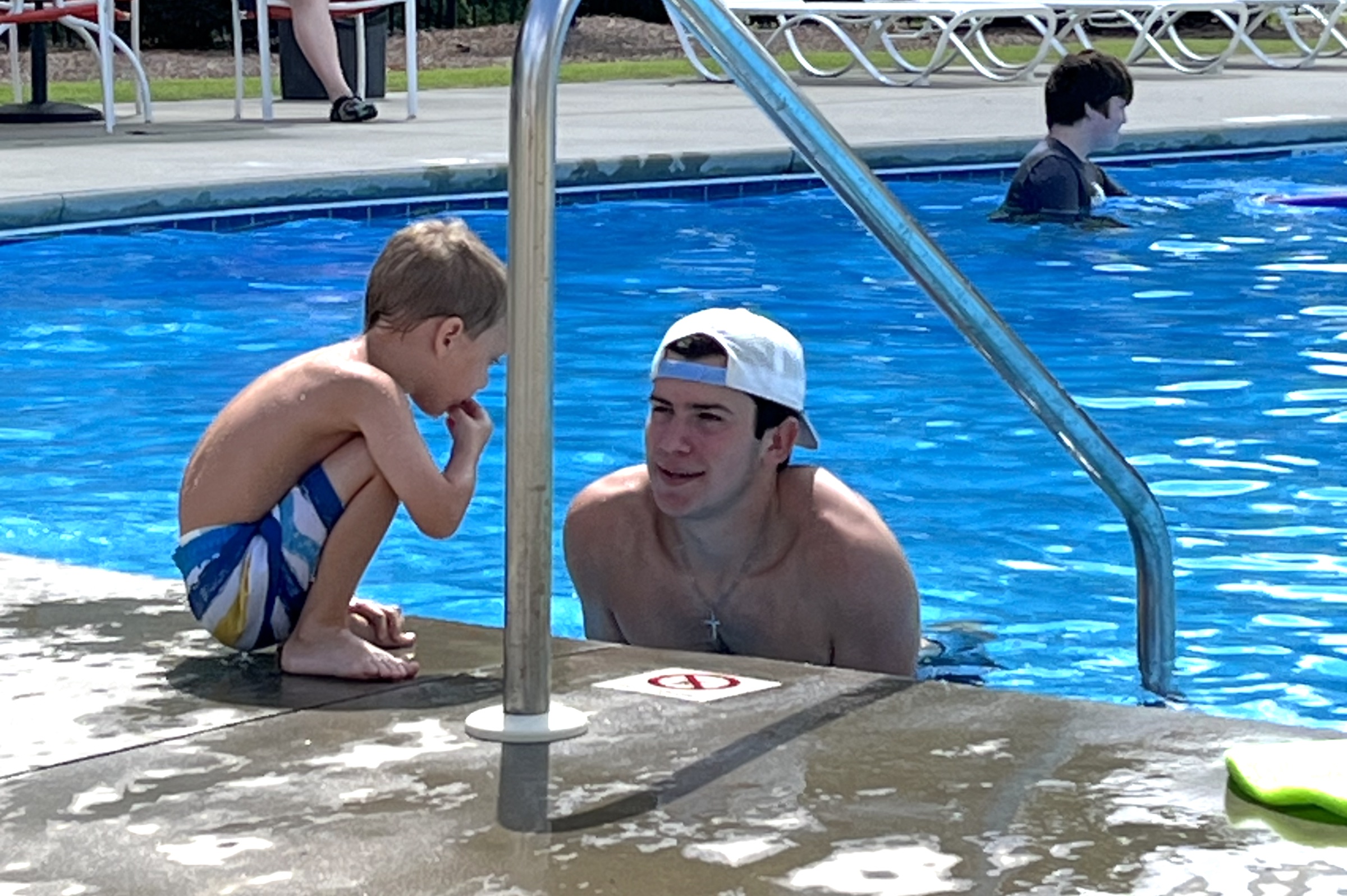 Teen hosts swimming camp for children with autism