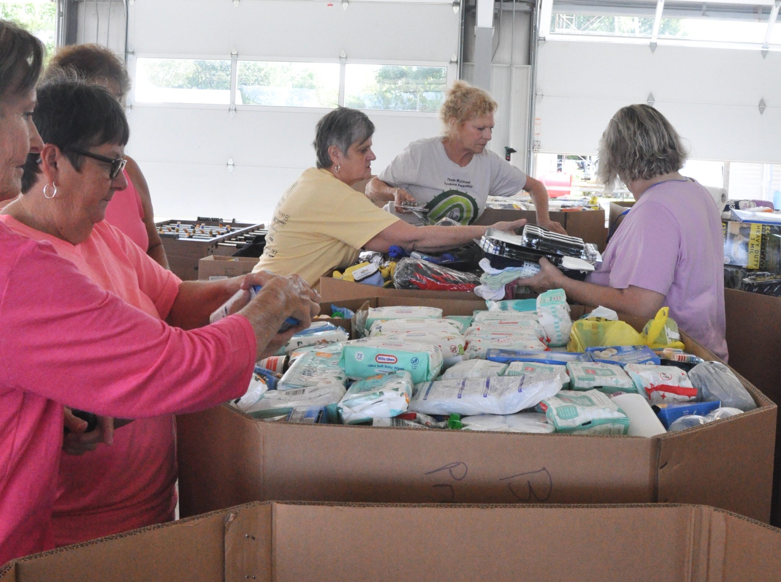 Calypso volunteers organizing supplies