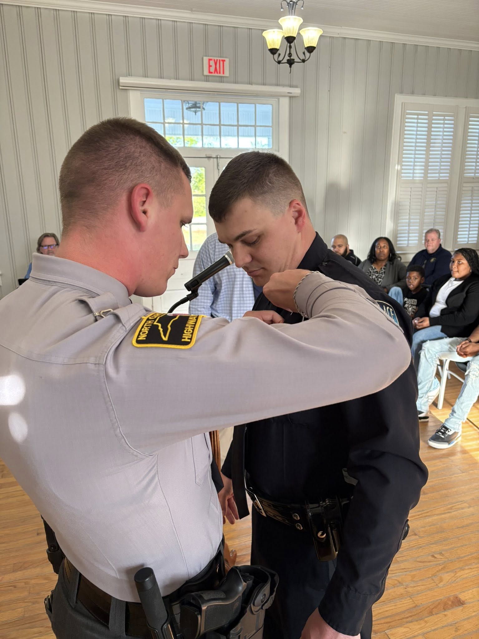 Sholar gets badge